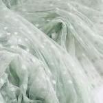 Pistachio spot tulle fabric..